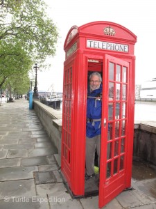 Cell phones have replaced the classic red phone booths on the streets of London, but they still beg for photos.