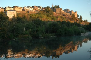 In the morning the castle of Puebla de Santabria, built around the 15th century, was reflected in the Tera River next to our camp.