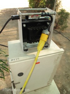 Our compact transformer converts the 220-230 volts used in most of the world to the 110-120 volt power we need.