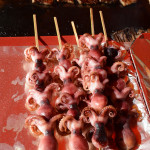 Baby octopus on a stick or grilled and dipped in a tangy sauce?