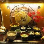 Similar to South Korea, the menu of a restaurant is shown full size in the window.