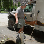 Using a “water thief” and one of our collapsible hoses we filled our tank from a roadside spigot.