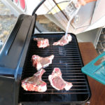 Fresh lamb chops sizzled on the grill. Are we roughing it yet?