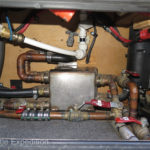 A series of manifolds and valves allow us to direct the hot coolant from the engine or the D5 Hydronic to whatever we need to heat. A water tank drain and an external water outlet is very convenient.